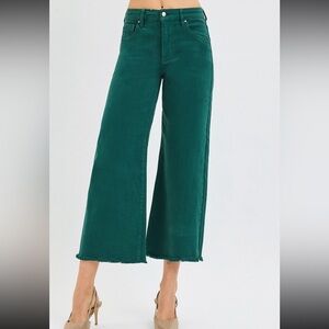 New with tags. Risen jeans. Wide leg fray hem. Tummy control. Hunter green